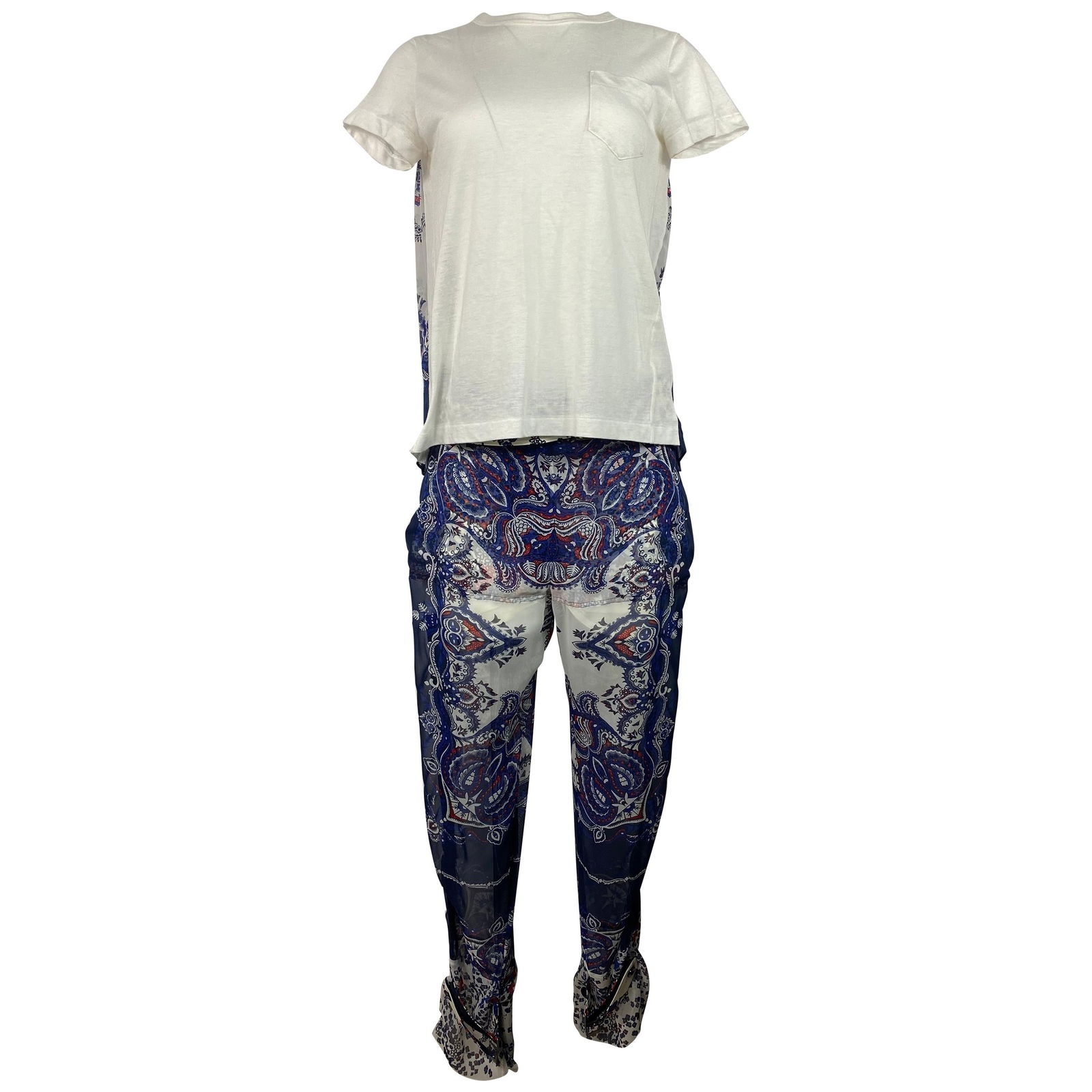 Sacai White and Blue Short Sleeve Top and Pants Suit Set: Product details: Featuring white front short sleeve t-shirt top, crew neck, front pocket. White, blue and red floral and flare detail on the back. Loose fit. Size 3. Length is 25", bust is 36". The