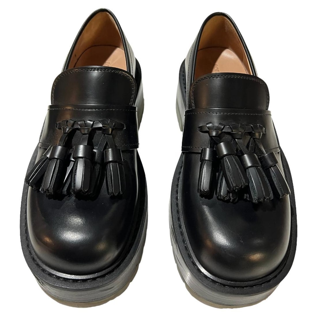 Bottega Veneta Black Leather Loafer Shoes, Size 40: Tassel detail Round toe Rubber platform Comes with the box Reserve: $600.00 Shipping:Domestic: Flat-rate of $85.99 to anywhere within the contiguous U.S.International: Foreign shipping