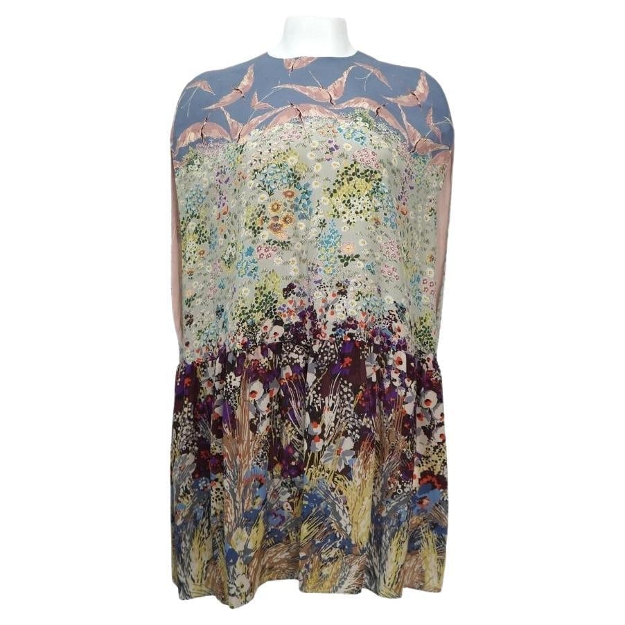 Valentino Multicolor Floral Landscape Silk Cape Mini Dress: VALENTINO pastel silk 2016 LANDSCAPE CREPE CAPE Dress size 40 Multicolor landscape and flamingo print in crepe de chine silk (100%). Features cape-inspired sleeves, round neck, dropped waist with a