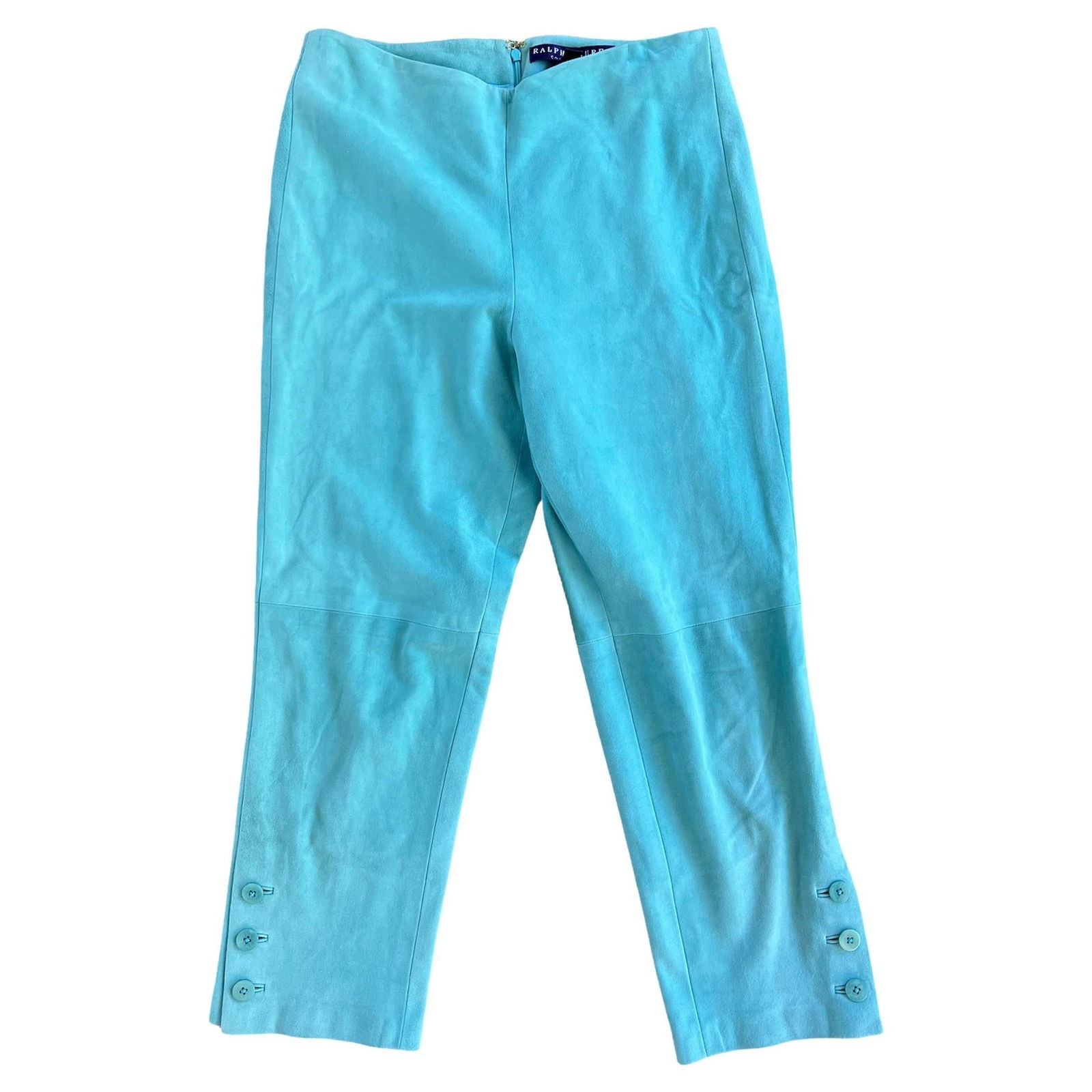 Ralph Lauren Turquoise Suede Capri Pants, Size 9: 100% suede Mid raise 3/4 length, capri style Buttons detail on the sides Concealed rear zip closure Made in USA Reserve: $520.00 Shipping:Domestic: Flat-rate of $85.99 to anywhere within
