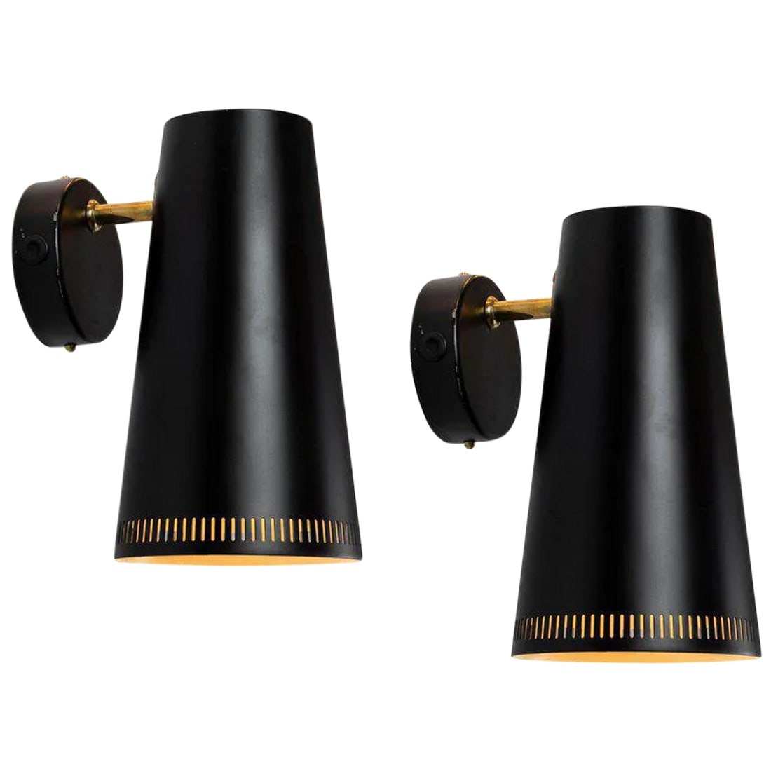 Large Paavo Tynell Black Wall Lights for Taito Oy - a Pair: Large pair of Paavo Tynell black wall lights for Taito Oy. Executed in black painted metal and brass. A highly adjustable and exceptionally refined pair of sconces. Manufactured in Finland in the