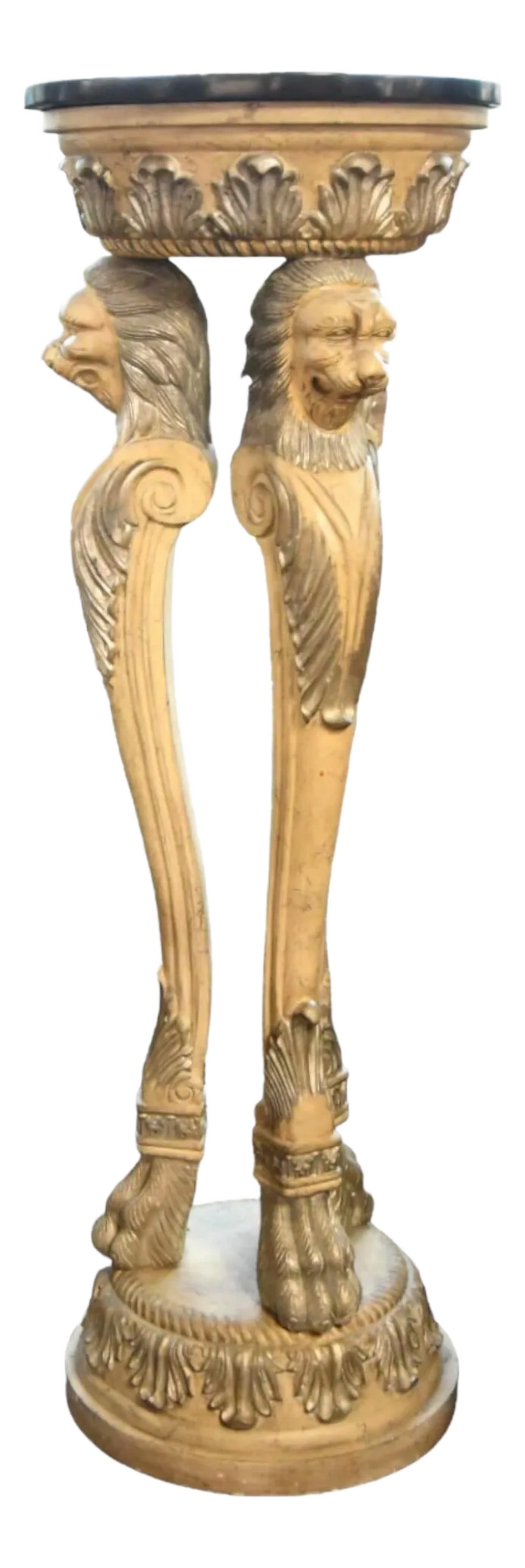 Late 20th Century Black Stone Top Carved Lions Pedestal Table: This striking Black Stone Top Carved Lions Pedestal Table features a luxurious black stone top and intricate classical carvings on the pedestal, showcasing detailed lion figures with lifelike