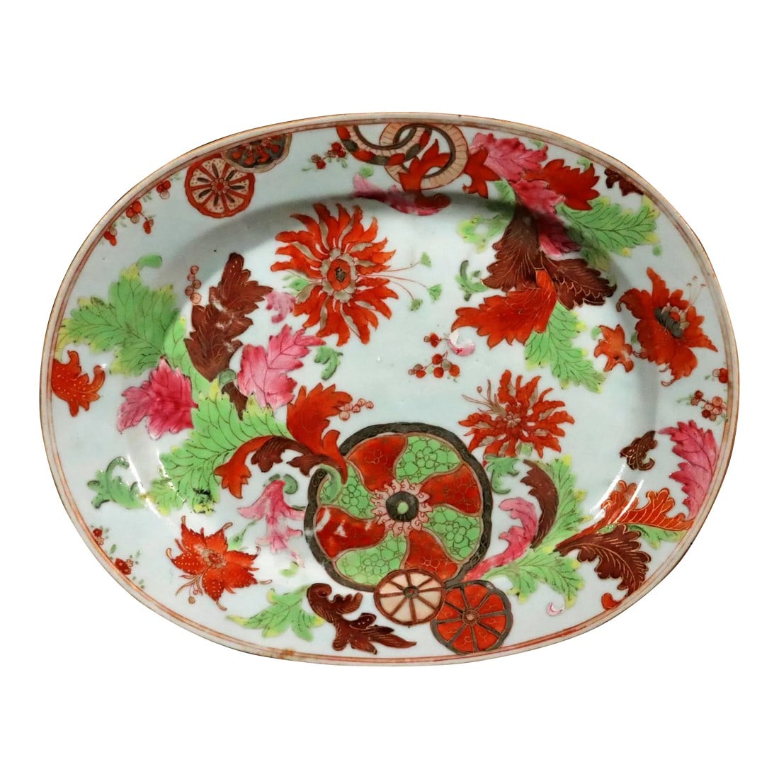 Verdant Splendor: Chinese Export "Pseudo Tobacco Leaf" Oval Dish: Verdant Splendor: Chinese Export "Pseudo Tobacco Leaf" Oval Dish This vibrant Chinese Export porcelain oval dish, dating from circa 1765, presents a magnificent and early variation of one of the most