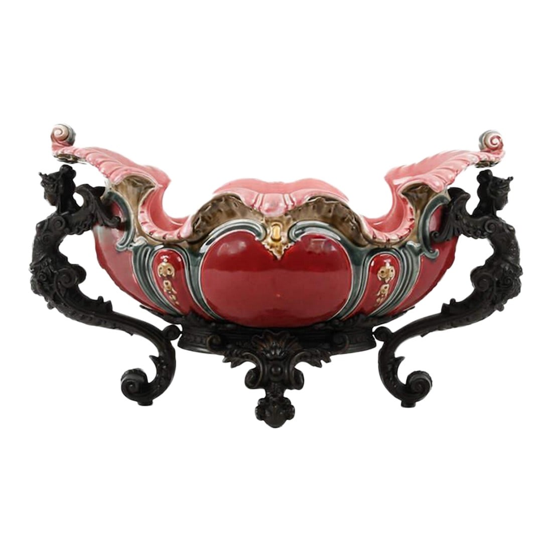 Early 20th Century French Majolica and Figural Cast Metal Jardinière: A French Majolica and Figural Cast Metal Jardinière combines vibrant, glazed majolica ceramic with intricate cast metal accents. The ceramic features bold, nature-inspired designs. The piece is