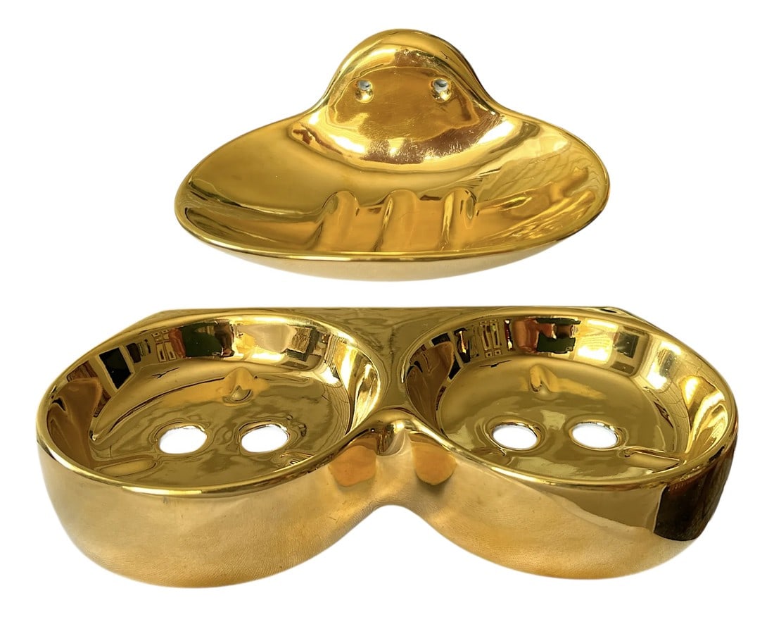1980s Bavarian Porcelain Gold Metallic Wall Mounted Soap Dish and Toothbrush Holder Set of Two: Glamorous meets functional in this dazzling pair of 1980s wall-mounted bathroom accessories, crafted of genuine Bavarian porcelain and finished in a high-gloss metallic gold glaze. This matching set