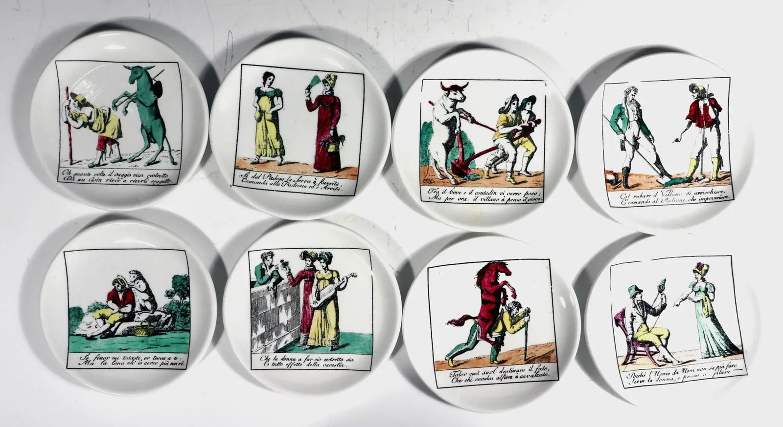 Piero Fornasetti Complete Set of Eight Ceramic Coasters, Il Mondo Alla Rovecia Pattern, ("The Tops - 2