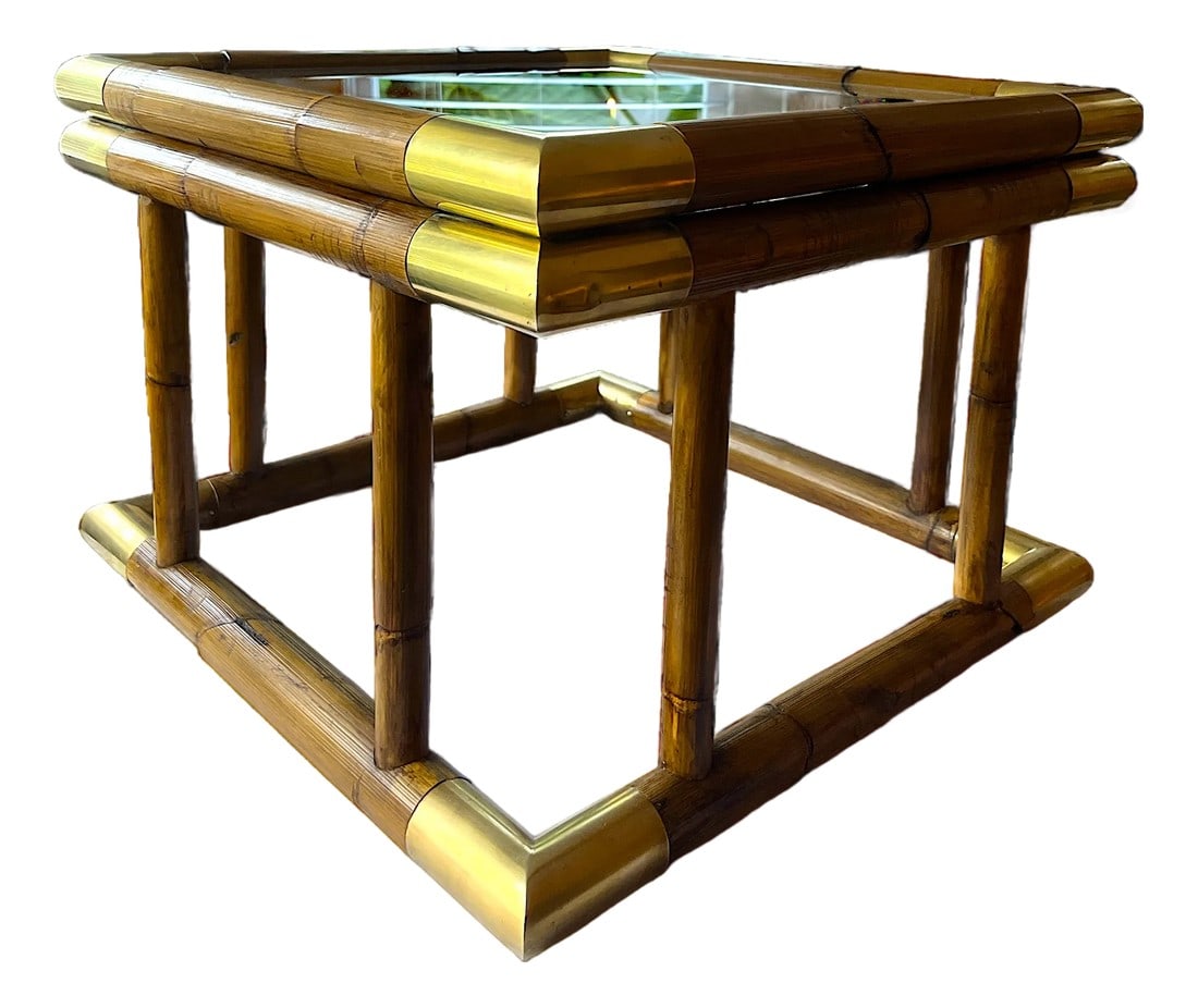 1970s Bamboo & Brass Square Side Table With Glass Top: This striking vintage side table, crafted in the 1970s, blends organic warmth with a touch of glam. Its architectural cube form is constructed from richly patinated bamboo poles, accented at each corn