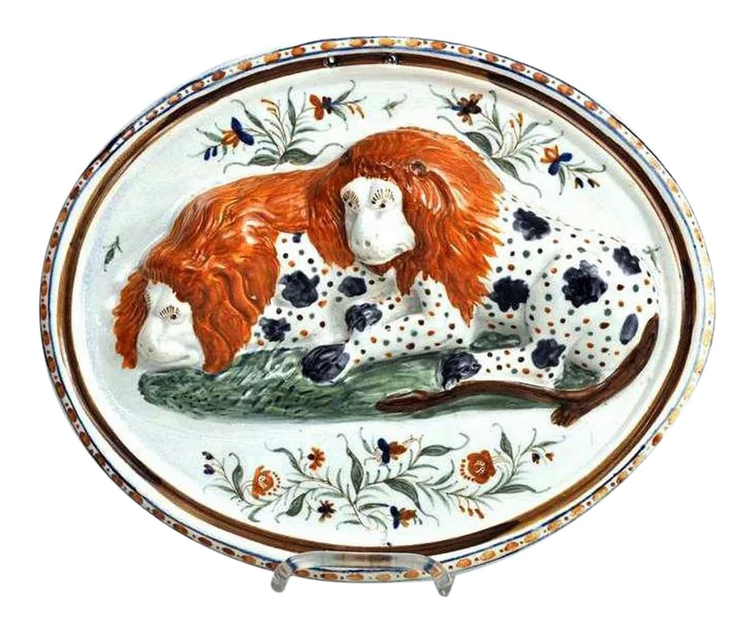 Prattware Pearlware Pottery Plaque of Lions: The Majestic and the Mundane: A Prattware Plaque of Folky Lions This oval Prattware pottery plaque, dating from the Georgian/Regency period (Circa 1800-1840), offers a compelling glimpse into early