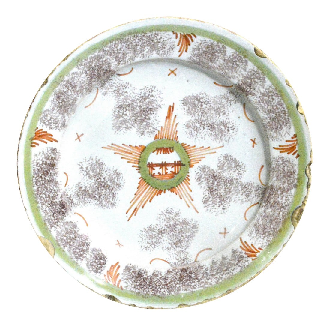 Bristol Delftware Star Plate: Star of Bristol: Tin-Glazed Earthenware, Circa 1745 Object: Shallow Dish / Plate Origin: Bristol, England Date: Circa 1740-1750 Medium: Tin-Glazed Earthenware (Delftware) Decoration: Sponged Manganese
