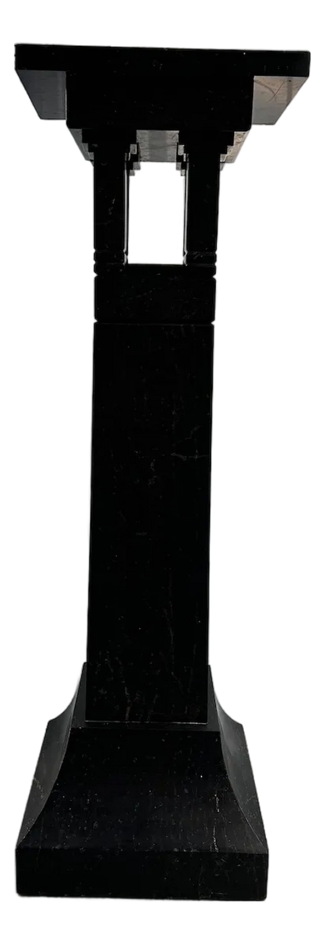 Art Deco Black Marble Pedestal: Art Deco black marble pedestal. 1920's pedestal with intricate carvings and column details. Condition: Alterations: Original Condition Unaltered Imperfections: Some Imperfections Condition Notes: Wear