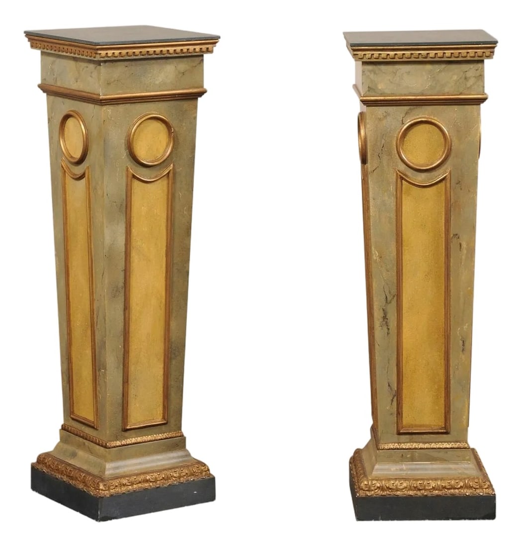 Mid 20th Century Italian Faux-Marble Column Pedestals – A Pair: An Italian pair of nicely trimmed column pedestals, with faux-marble paint, from the mid 20th century. This mid-century pair of pedestals each feature a squared top above a squared and tapering column