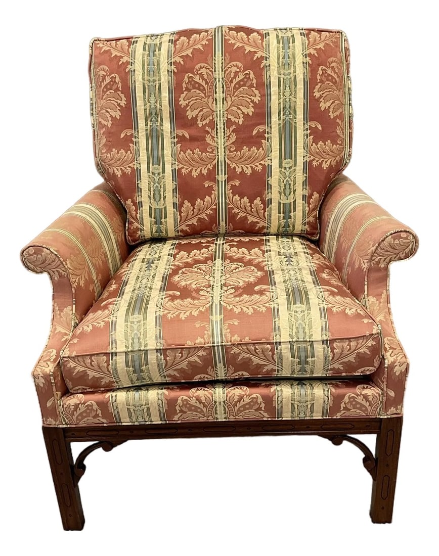 Southwood Chippendale Arm Chair With Mahogany Hand Carved Frame: Southwood Chippendale fabric arm chair with carved mahogany frame and legs. High quality cotton fabric. Rose field boarded by tan and light green stripes. Coordinated piping and fringe. Southwood & Co