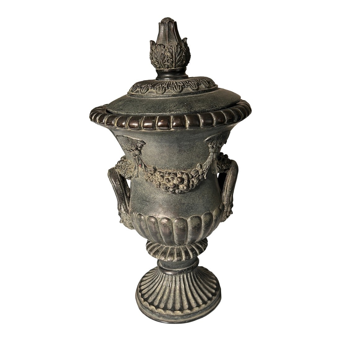 Early 20th Century Cast Stone Black Garden Ornament Rococo Revival: Beautiful cast black stone garden ornament in revival rococo style. These urns are highly sought after by designers and decorators. Sides are done in a neoclassical fluted manner. A neoclassical