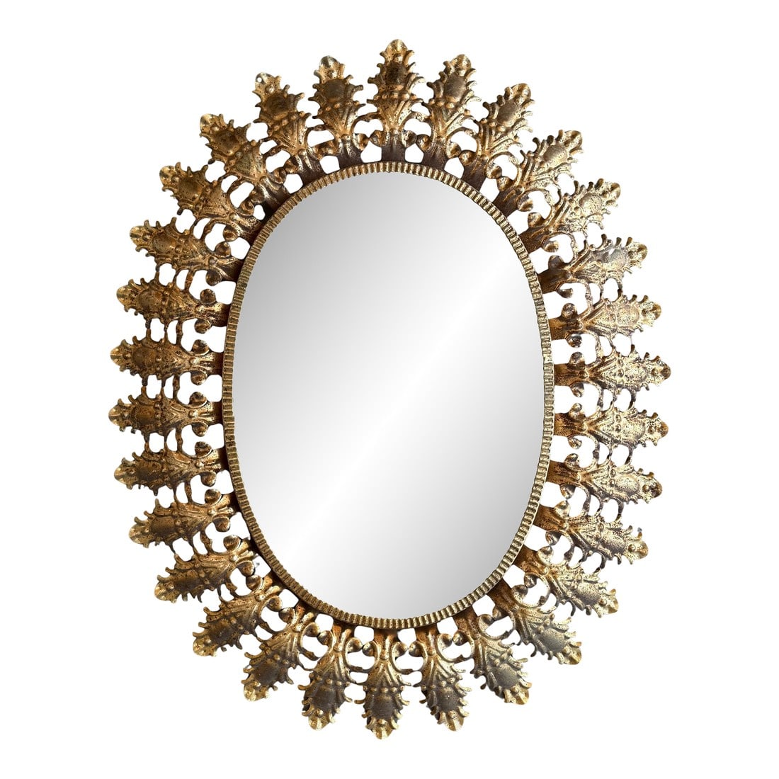 Mid 20th Century Spanish Gilt Metal Oval Sunburst Mirror: Spanish 1950s gilt metal oval sunburst mirror with tight connected leaf pattern frame. Condition: Alterations: Unknown Imperfections: Some Imperfections Condition Notes: Good Refinished. Wear consiste