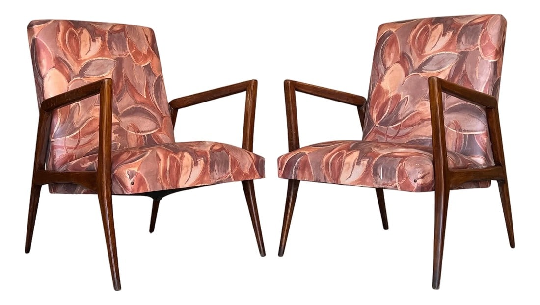 Mid 20th Century Pair of Scandinavian Mid-Century Modern Colorful Teak Club Armchairs: Stylized teak chair with aerodynamic open arms with newly constructed loose cushions in durable colorful geometric silk fabric . In fantastic condition and very comfortable. Condition: Alterations: