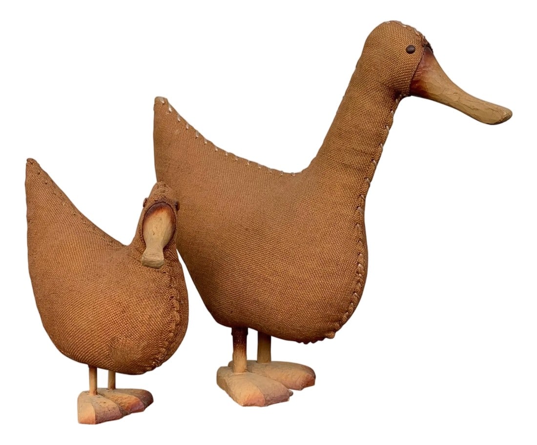 Midcentury Pair of Wicker Woven Ducks with Wood Details: Wicker duck from with an intricate woven wicker structure and highlighted with wood wings and a sculpted bill and feet. Condition: Alterations: Unknown Imperfections: Some Imperfections Condition