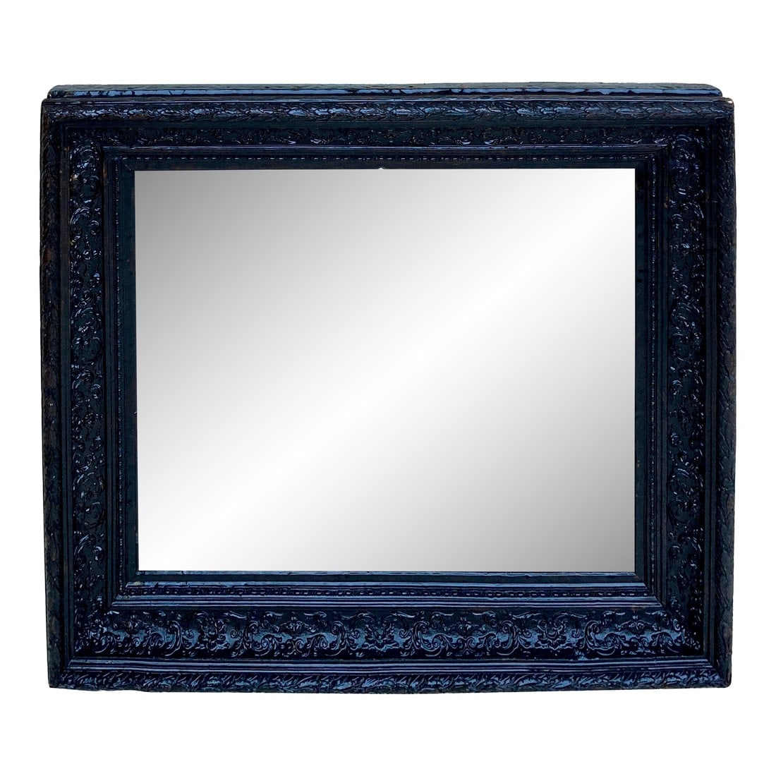 French Dark Framed Carved Wood Wall Mirror, 1920: Mirror from the 1920s, made up of a large black walnut wood frame that elegantly supports the mirror. Original mirror. Frameless mirror measurements: height: 53.5cm width: 65cm Condition: