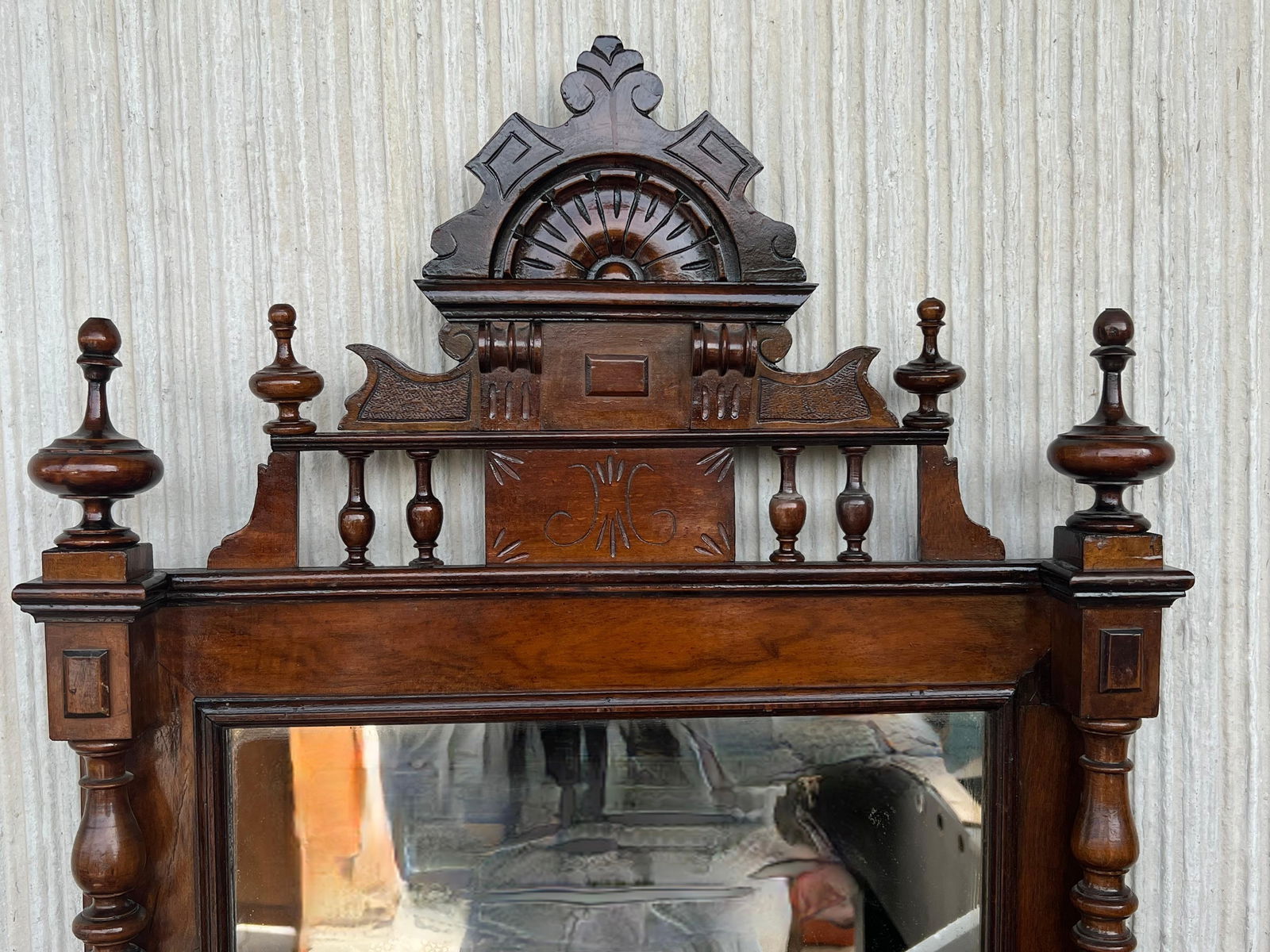 Early 20th French Ebonized Mirror with Turned Columns and High Carved Details - 17