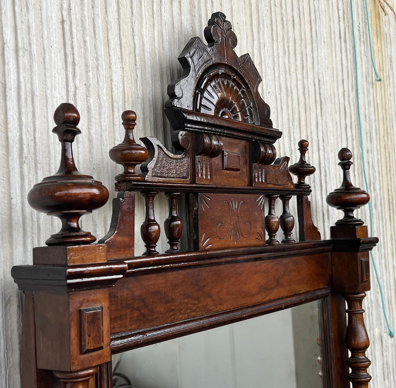Early 20th French Ebonized Mirror with Turned Columns and High Carved Details - 18