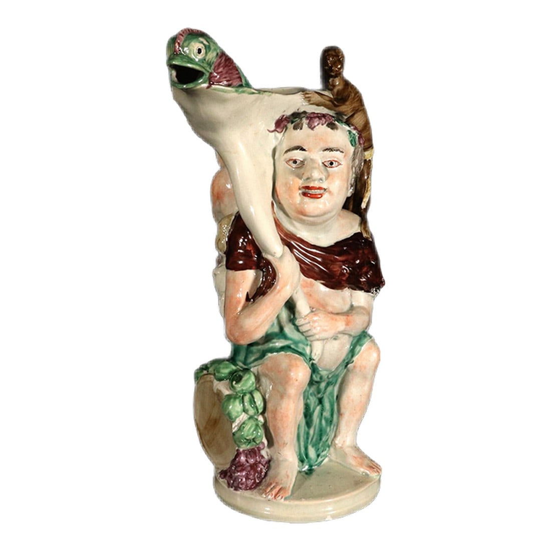 English Staffordshire Pearlware Pottery Large Bacchus Jug: Revelry in Relief: A Magnificent Staffordshire Pearlware Bacchus Jug This monumental English Pearlware Pottery Jug offers a glimpse into the vibrant world of late 18th and early 19th-century