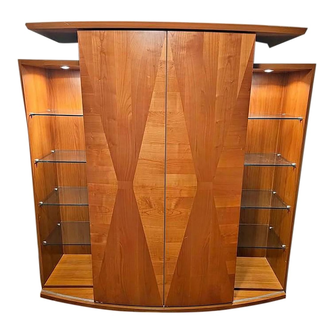 Late 20th Century Alf Italia Olga Entertainment Center Â· Italian Modern Wall Unit Â: Description This is the Olga Entertainment Center by Alf Italia, a substantial Italian modern wall unit designed to combine media storage with illuminated display. Crafted in warm wood veneer with dra