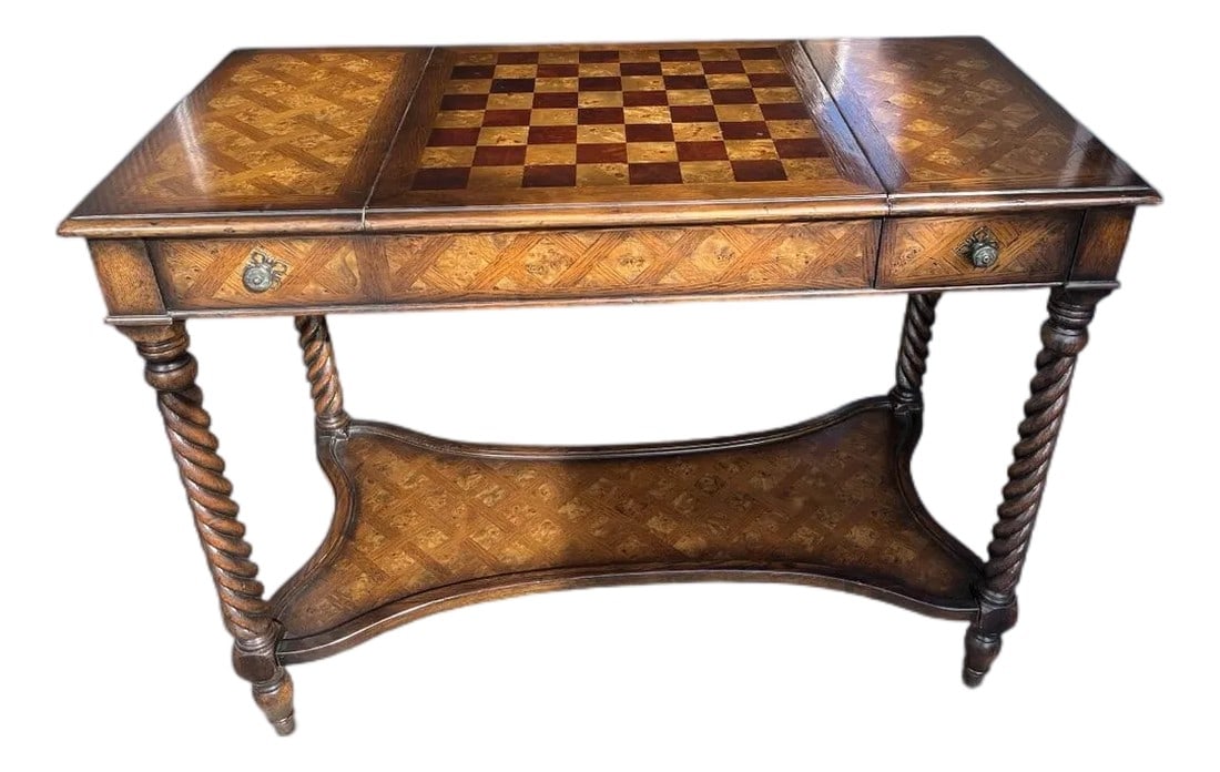 Vintage Bombay Company Parquetry Game Table: Elegant and versatile vintage game table by the Bombay Company, dating to the 1980s. This finely crafted piece features a richly detailed parquetry veneer throughout, showcasing warm wood tones and