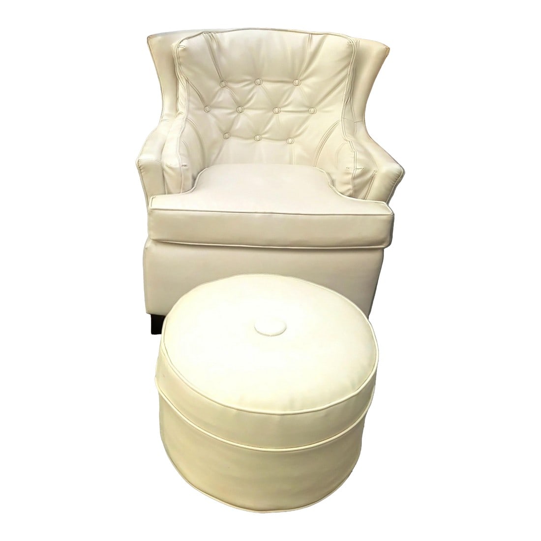 Exquisite Cream Color High-Quality Mid-Century Modern Masterpiece Wingback Chair and Matching Ottoma: Introducing a stunning fusion of comfort and iconic design: this exquisite cream color high-quality faux leather wingback chair and matching ottoman set is the epitome of Mid-Century Modern