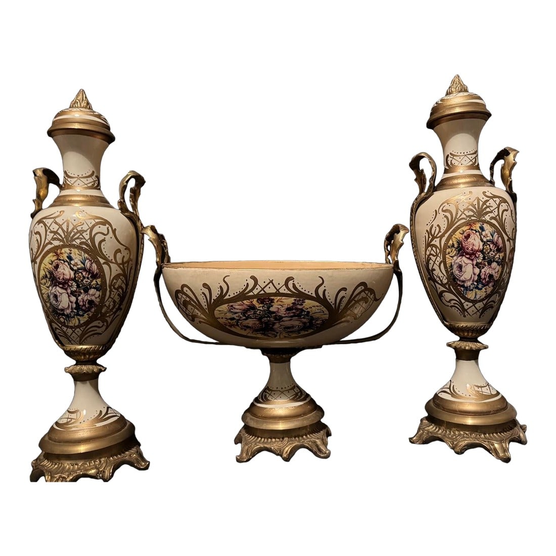 1970s French Style Cream Gilt Porcelain Garniture Set of 3: Vintage French-Style Porcelain Jardiniere with Two Urns (circa 1970) This refined and elegant three-piece porcelain garniture set, consisting of a central jardiniere and two matching urns, dates to