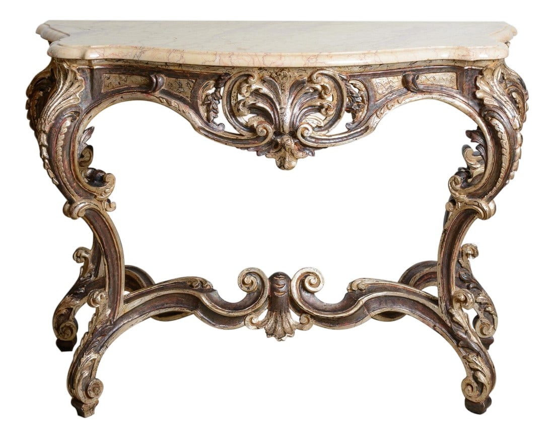 Regency Style Console With Marble Top: Regency style marble top console table with a cream and tan veined top and shaped edge. The finish is a subdued silver, grey and gold finish. Condition: Alterations: Original Condition Unaltered