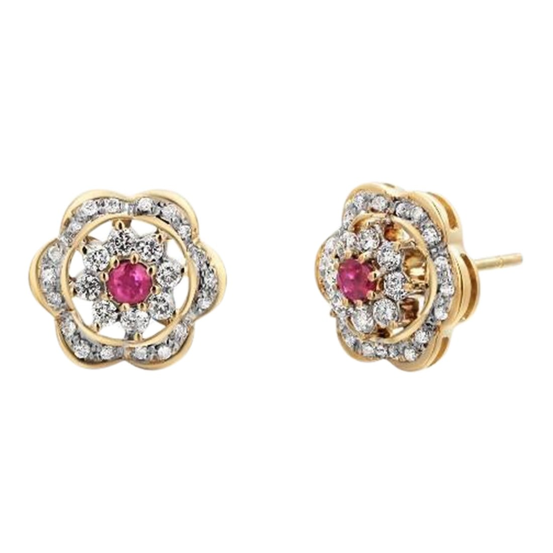 14 Karat Yellow Gold Floral Ruby and Diamond Earrings, A Pair: A charming blend of elegance and femininity, these pre-owned 14K yellow gold earrings feature a timeless floral design set with vibrant rubies and sparkling diamonds. Measuring approximately 0.53
