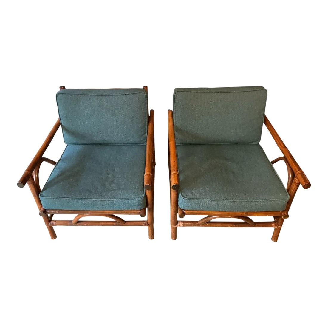 Mid-Century Modern Rattan Bamboo Lounge Chairs, Pair: This charming pair of vintage mid-century modern (likely 1970s-1980s) bamboo lounge chairs features sculptural, organic frames crafted from natural bamboo poles with warm, aged patina and subtle