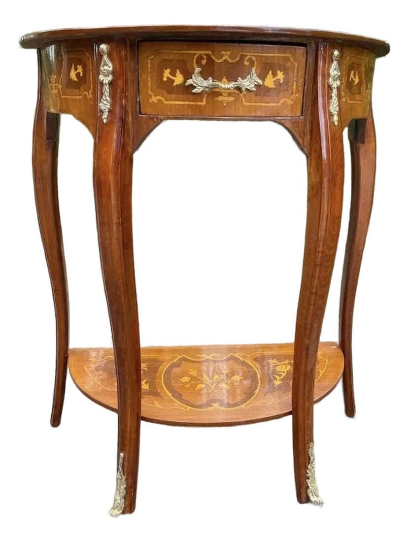 1970 French Louis XVI Mahogany Bronze Side Table – 1 Pc: Date / Period: Circa 1970 (20th Century, Louis XVI Revival) Maker / Brand: French Artisan Maker (Unsigned) Style: Louis XVI / Neoclassical Revival Color: Warm Mahogany with Gilded Gold Accents