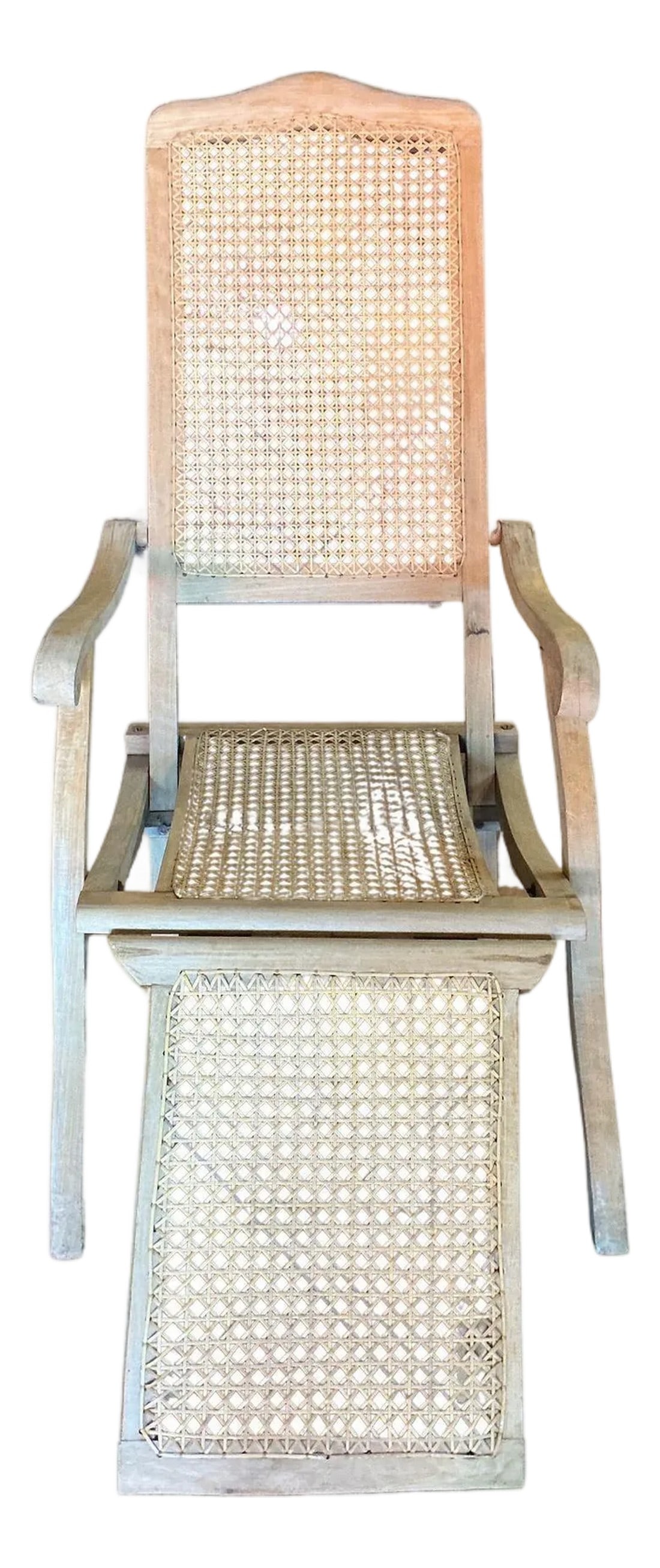 1920's French Caned Chaise Lounge Bleached: Early 20th century French teak-wood and woven cane steamer recliner armchair, the whole armchair including the foot stool folds flat Condition: Alterations: Original Condition Unaltered