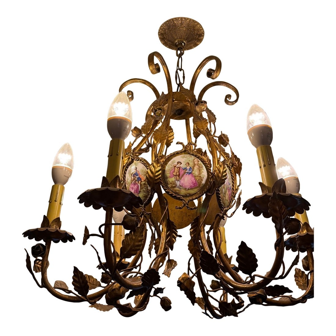 Vintage Gilt Metal & Hand-Painted Porcelain Medallion Chandelier, Rococo Revival Style: This exquisite vintage chandelier features an ornate gilt metal frame adorned with scrolling arms, leaf and floral motifs, and hand-painted porcelain medallions depicting romantic pastoral scenes,