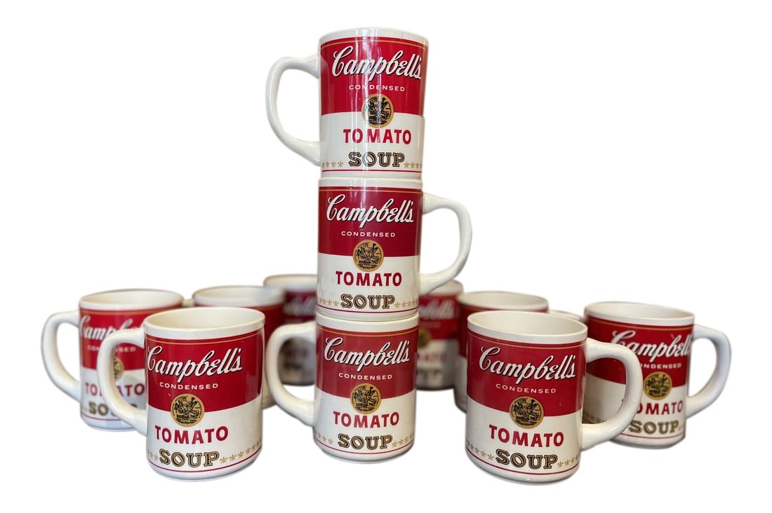 1968 First Edition Campbell's Soup Mugs- Set of 11: Exceptionally rare set of 11 first edition 1968 Campbells Soup mugs. The mugs were part of the Campbell's Soup Collectibles released after the popularity of Andy Warhol's iconic 1962 "Campbells Soup
