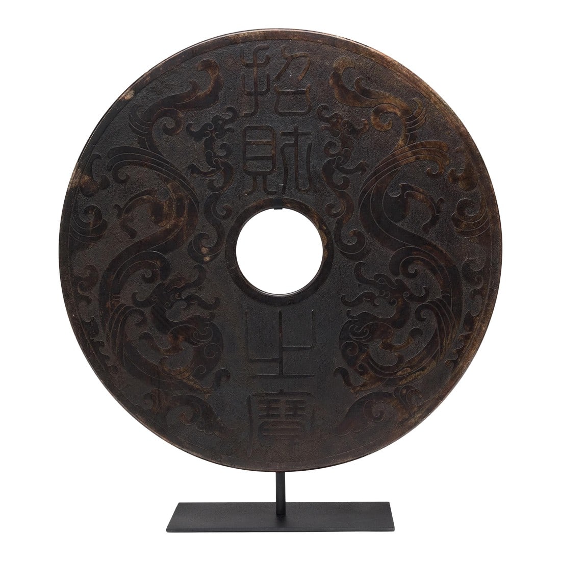 Chinese Twin Dragon Bi Disc: The Chinese bi disc has a mysterious and spiritual history, and its function and significance remains uncertain. Thought to provide a conduit to the celestial plane, the bi disc is always carved of