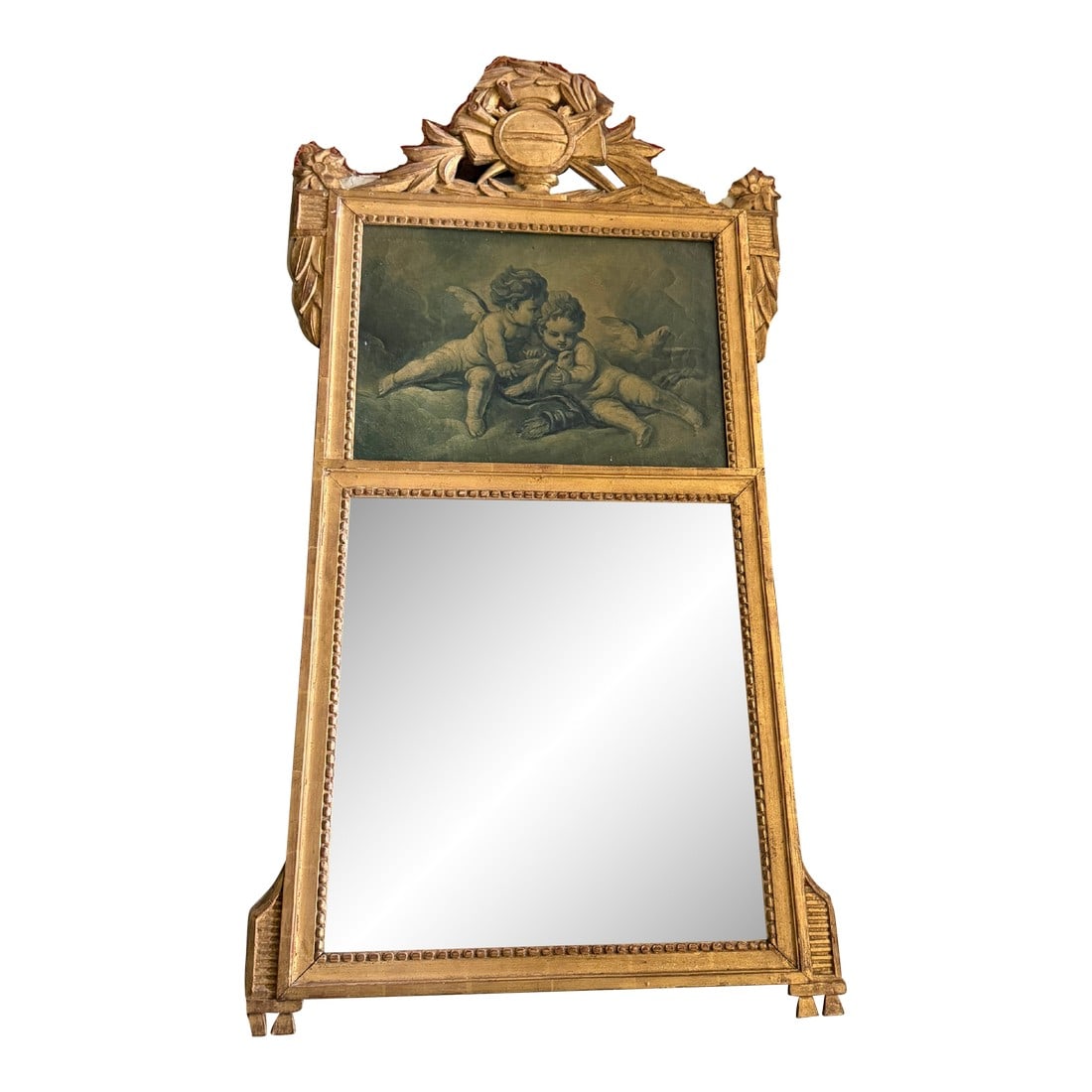 19th Century French Louis XVI Trumeau Mirror With Cherub Panel: Elegant 19th-century French Louis XVI–style trumeau mirror featuring a richly carved giltwood frame. The upper panel showcases a classical cherub scene, adding softness and historic charm,