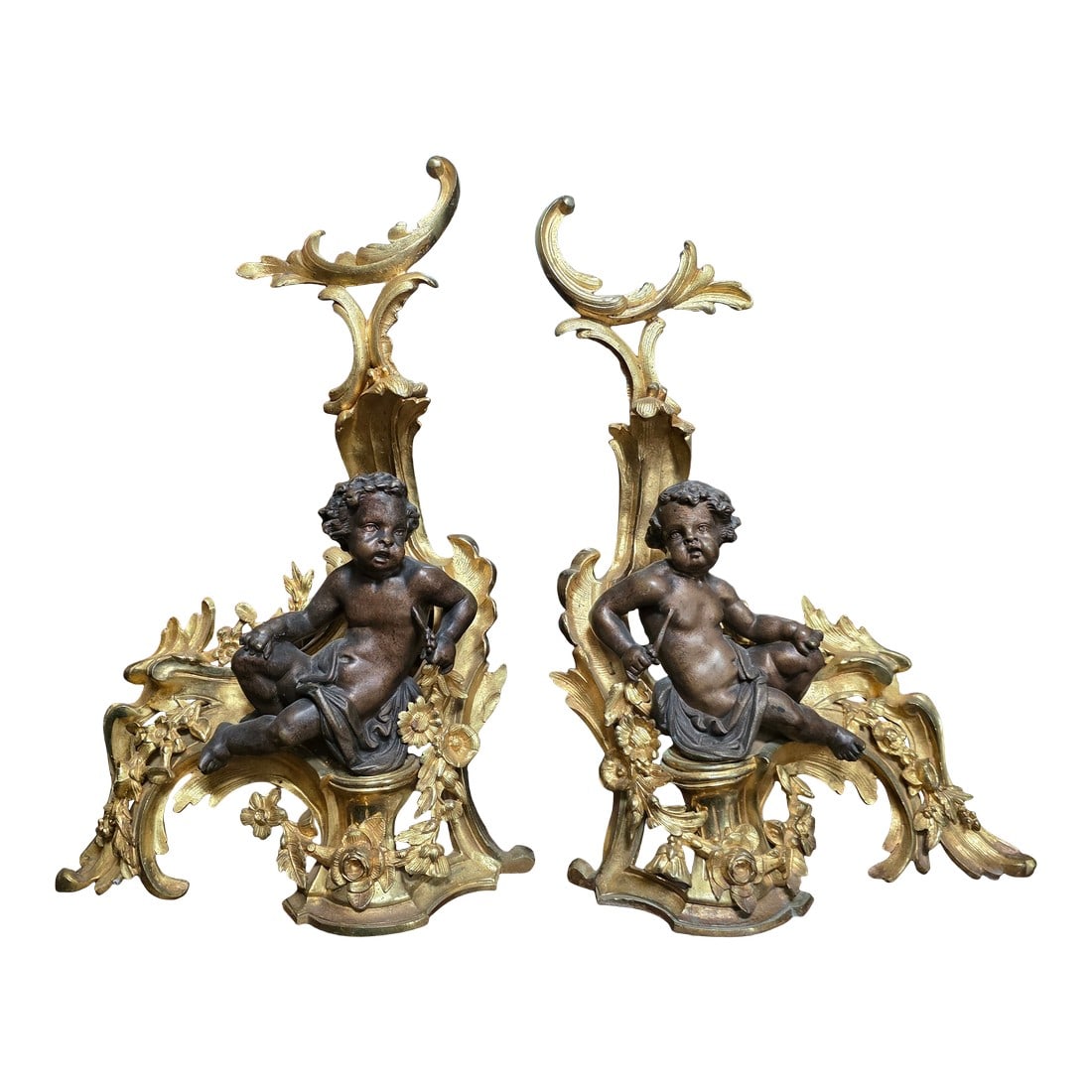 Antique French Chenets With Cherubs: Beautiful antique French gilt bronze chenets with cherubs. Condition: Alterations: Original Condition Unaltered Imperfections: Some Imperfections Condition Notes: Great condition Dimensions: