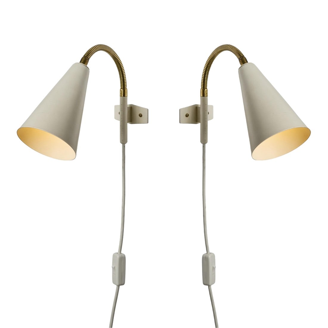 1960s Plug-in White Conical Brass & Metal Wall Lamps Attributed to Hans Agne Jakobsson - a Pair: Pair of 1960s Plug-in White Conical Brass & Metal Wall Lamps Attributed to Hans Agne Jakobsson An functional midcentury plug-in wall lamp design executed in a white painted metal shade and