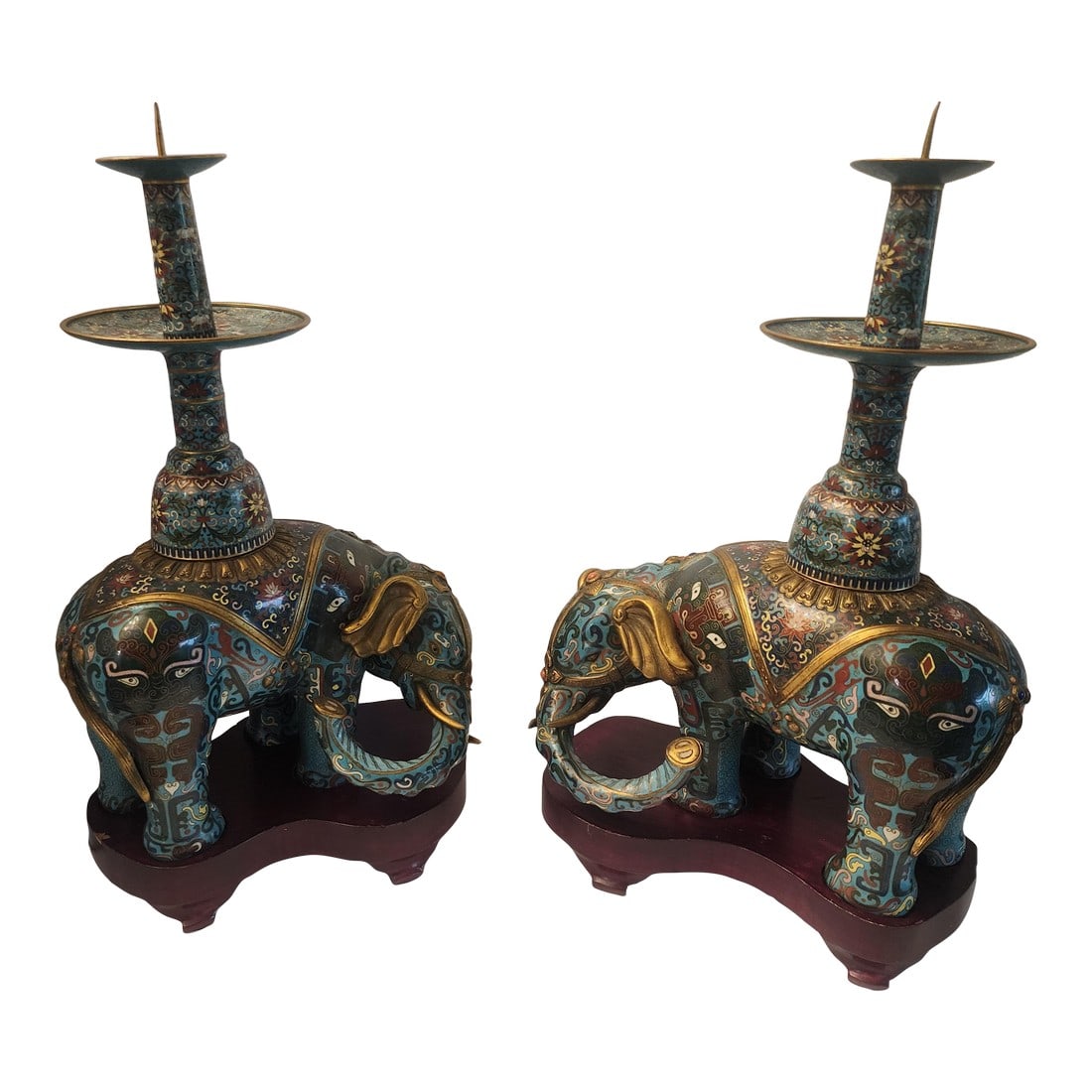 18th Century Important Pair Gilt Bronze and Cloisonne Elephant Altar Candle Holders: Each elephant stands on a fitted wood stand with slightly turned and lowered head and raised trunk. Detailed with exquisite cloisonne enamel in a foliate design on a turquoise background;