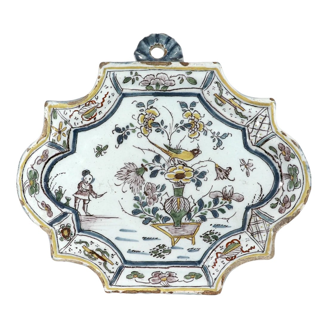 Dutch Delft Chinoiserie Polychrome Plaque: Dutch Delft Chinoiserie Polychrome Plaque, Circa 1730-40 The shaped plaque has a raised molded border decorated with a series of alternating painted panels of flowers and Chinese auspicious objects. T