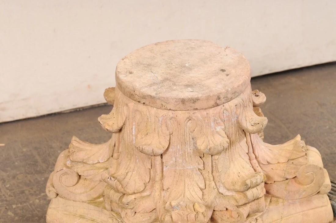 Spanish Hand-Carved Sandstone Pedestal Base: A Spanish carved-sandstone pedestal or column base. This vintage architectural stone column base from Spain, standing approximately 16.5 inches in height, has been hand-carved and features a flat,