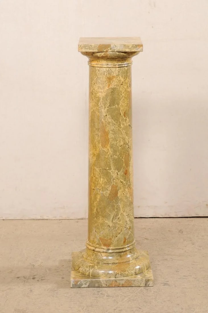 Mid 20th Century French Faux-Marble Painted Column Pedestal: A French faux-marble painted wood column from the mid 20th century. This vintage pedestal from France has a round-shaped column body, with a squared top. Circular banding/molding is found just