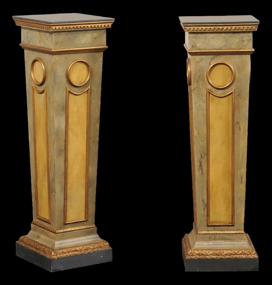 Mid 20th Century Italian Faux-Marble Column Pedestals – A Pair: An Italian pair of nicely trimmed column pedestals, with faux-marble paint, from the mid 20th century. This mid-century pair of pedestals each feature a squared top above a squared and tapering column