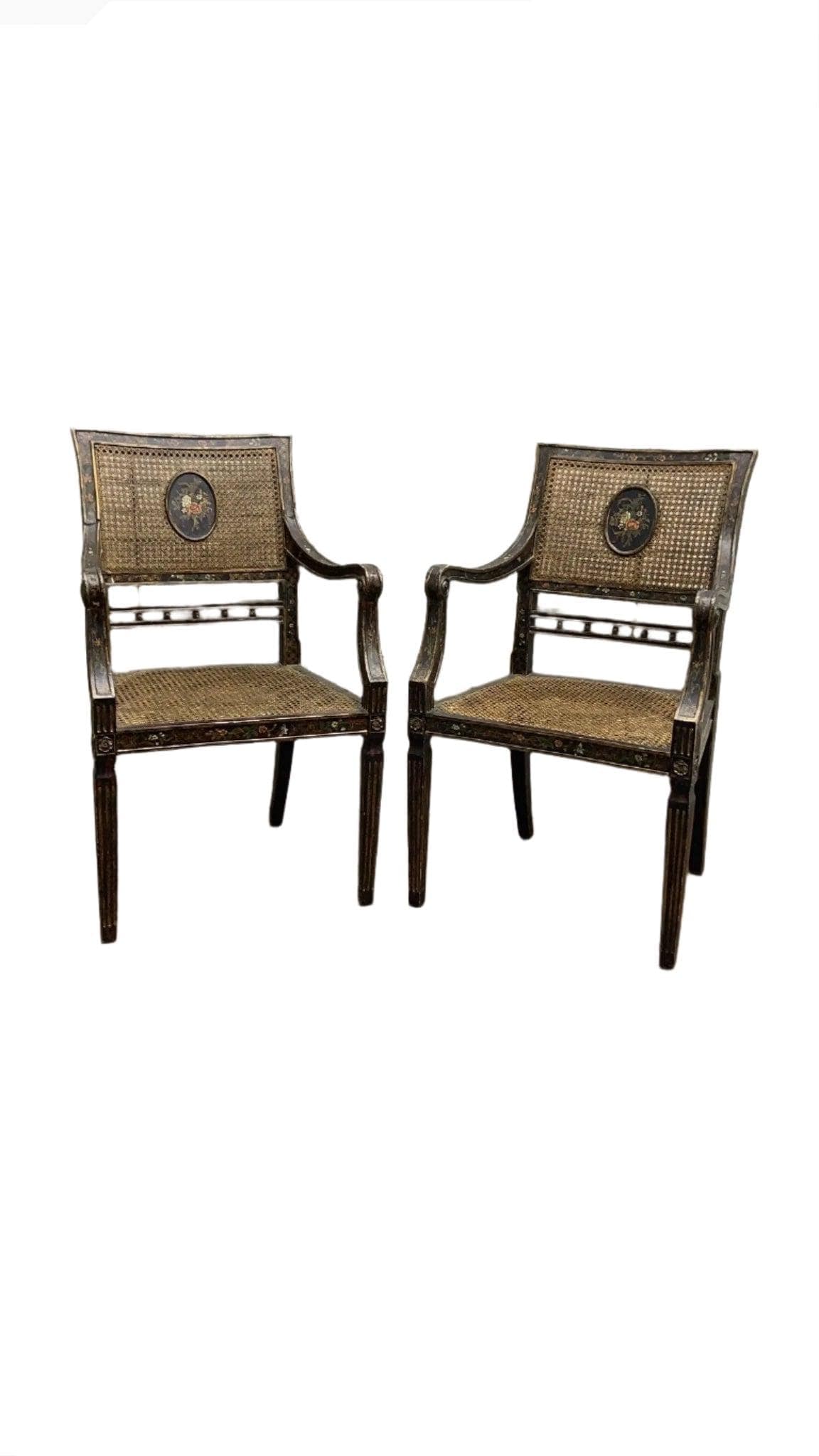Antique English Regency Hand Painted Cane Back Medallion Chairs - Pair: Title: Antique English Regency Hand Painted Cane Back Medallion Chairs - Pair Description: Antique English Regency Hand-Painted Cane-Back Medallion Armchairs- Pair These antique caned chairs showcase