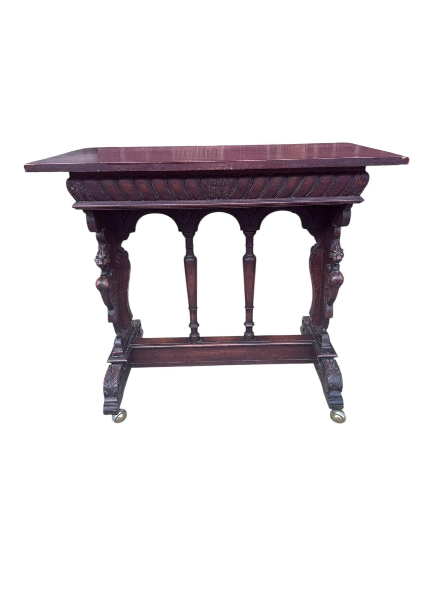 Antique Italian Renaissance Revival Style Console Table: Title: Antique Italian Renaissance Revival Style Console Table Description: Antique Italian Renaissance Revival carved Ornate Figural Bust, Winged Lions Head and Cherub Detailed Walnut Console Table T