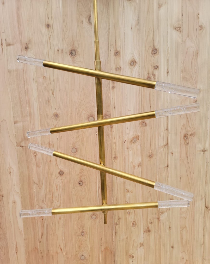 Kelly Wearstler Rousseau Articulating Chandelier in Brass Medium: Title: Kelly Wearstler Rousseau Articulating Chandelier in Brass Medium Description: Kelly Wearstler Rousseau Articulating Chandelier in Antique Burnished Brass with Seeded Glass The stunning