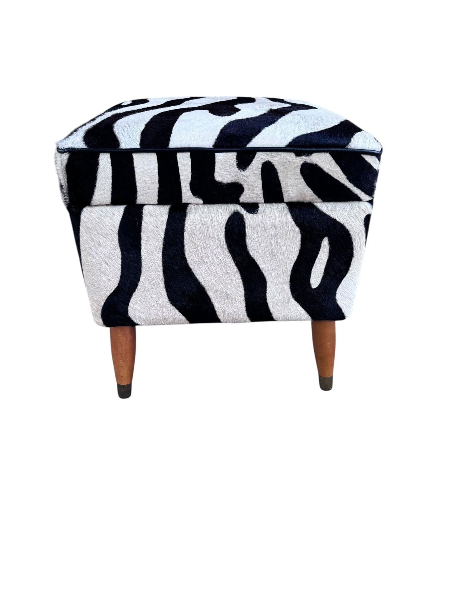 Vintage Storage Ottoman Newly Reupholstered in Zebra Cowhide: Title: Vintage Storage Ottoman Newly Reupholstered in Zebra Cowhide Description: Vintage Storage Ottoman Newly Upholstered in Zebra Cowhide Spice up your space with this zebra print upholstered