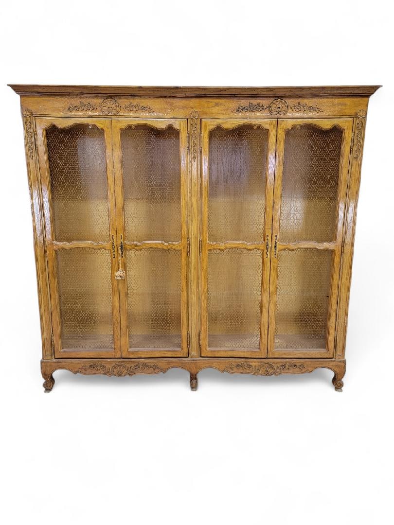 Antique French Country Chicken Wire Paneled Bookcase: Title: Antique French Country Chicken Wire Paneled Bookcase Description: Antique French Country 4 Door Chicken Wire Paneled Bookcase Store and display your treasured items in this large bookcase.