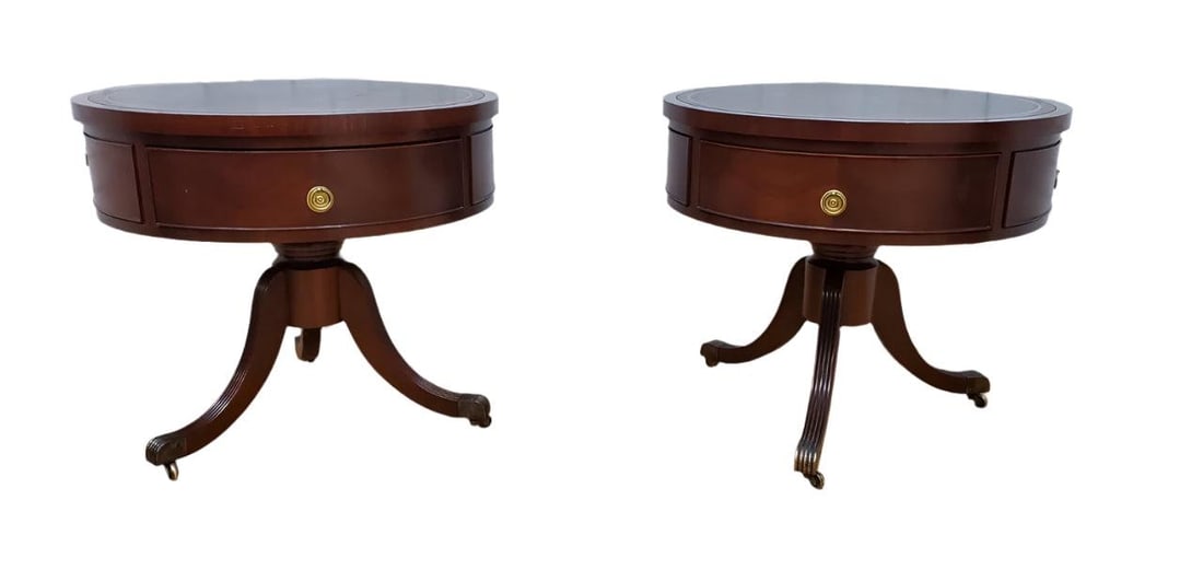 Vintage Inlaid Drum Side Tables - Pair: Title: Vintage Inlaid Drum Side Tables - Pair Description: Vintage Inlaid Leather Top Single Drawer Mahogany Drum Side/End Tables - PairThe top features a brown inset leather top with gold tooling. Th